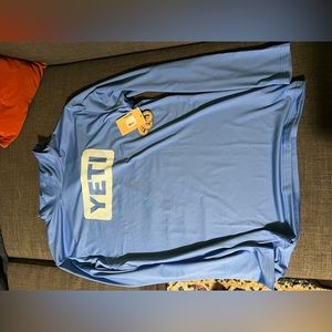 Yeti hoodie in blue brand new with tags still on